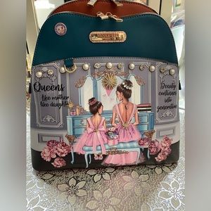 LIKE NEW❗️NICOLE LEE
DOUBLE QUEENS BACKPACK
